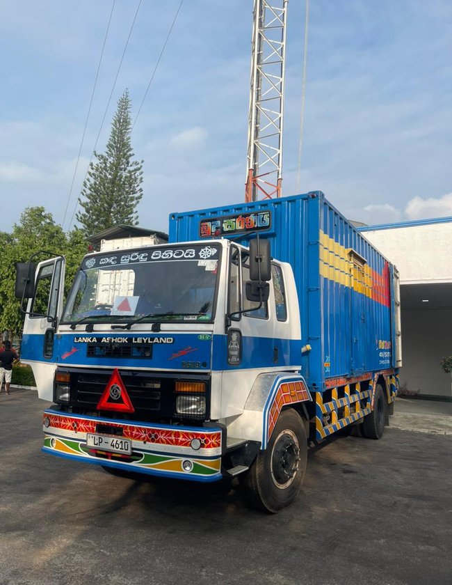 An Udaya Transport truck ready for loading at a customer site
